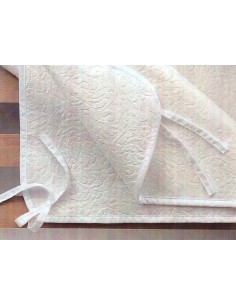 Couvre-sommier thermo-compact pour matelas à lacets